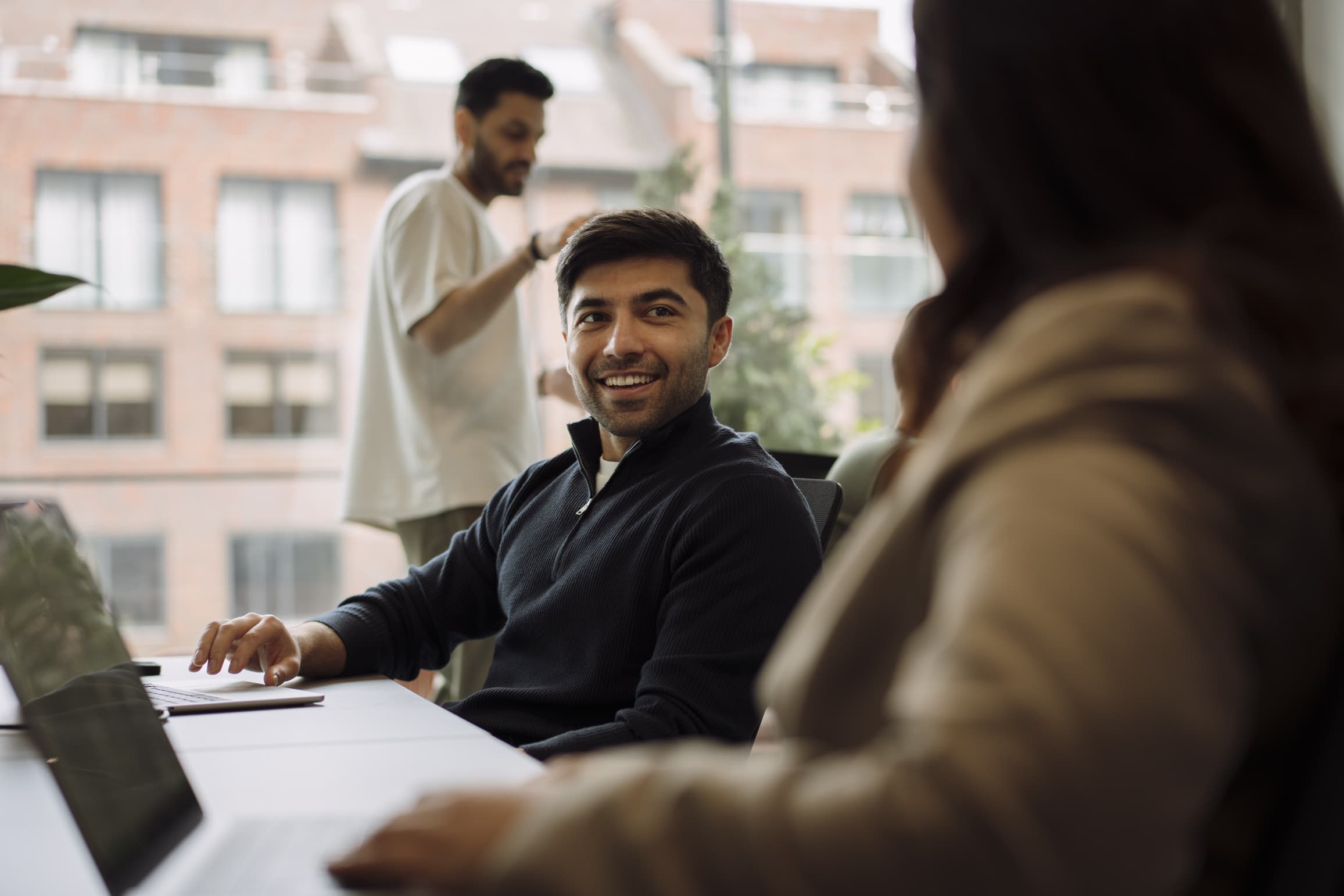 Karavel team members in conversation